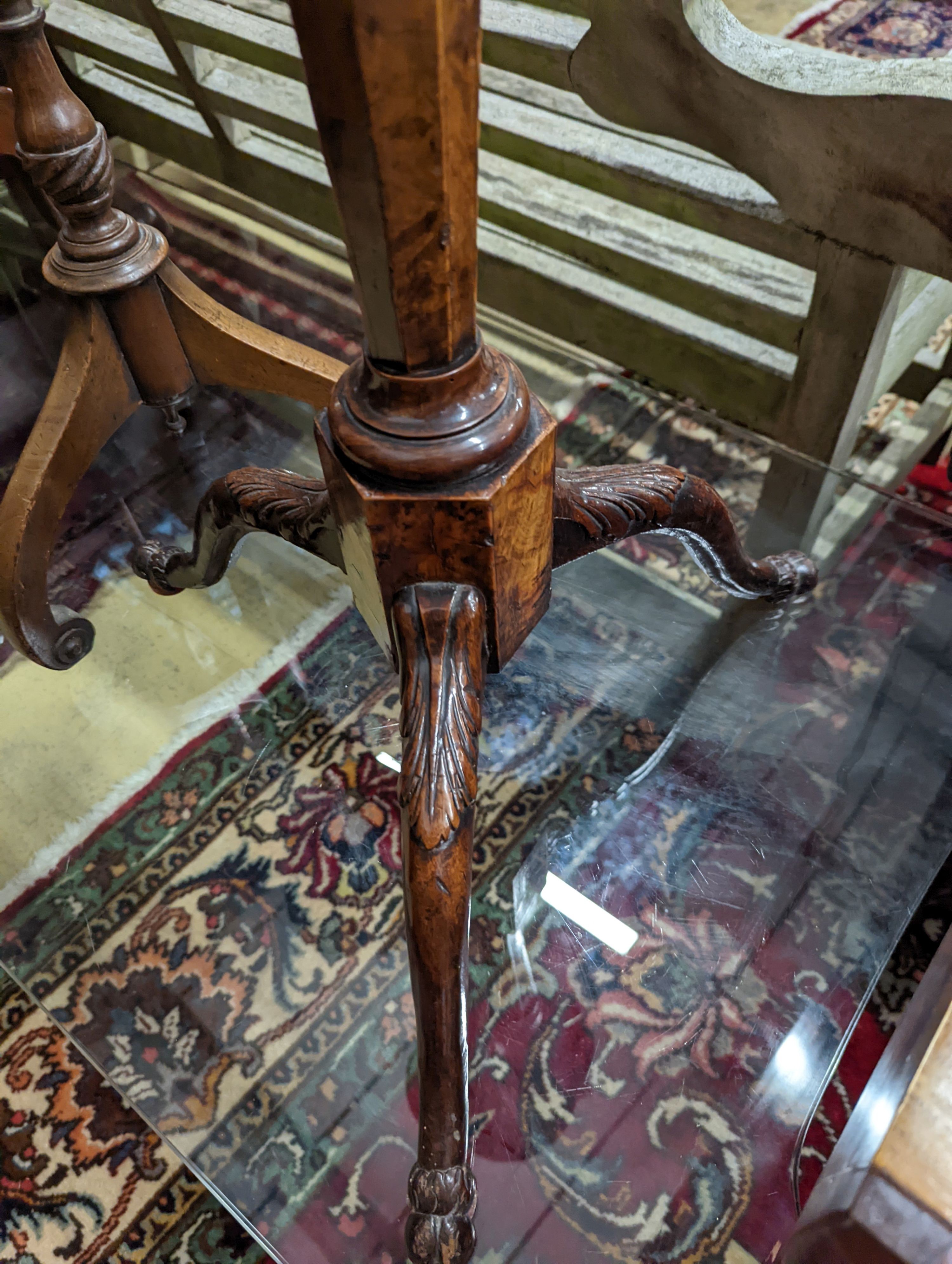 A George I style yew and walnut tripod candlestand, height 97cm, together with one other and a reproduction wash stand